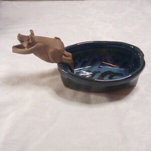Pig jumping out of a bowl pottery trinket holder